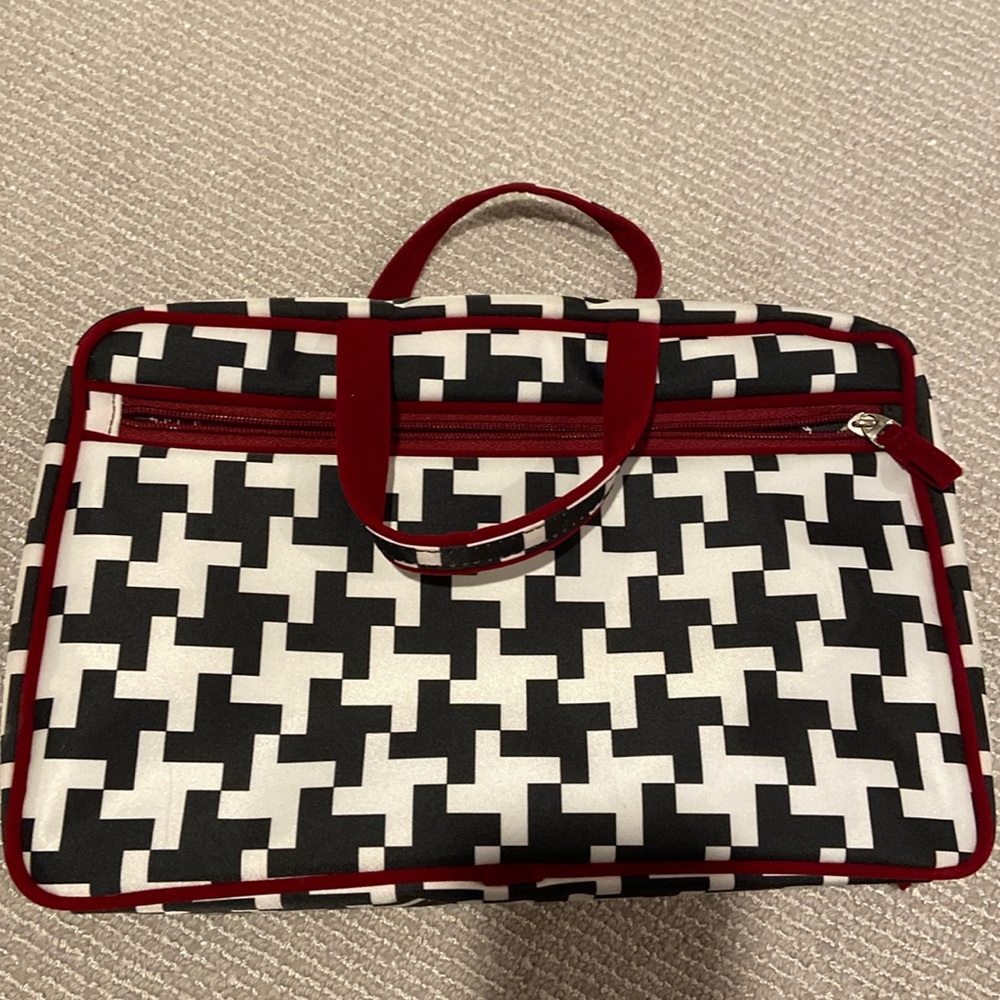 Travel case- never used. Outer zipper pouch- waterproof inside